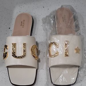 Gucci Women's Cream Slide Sandals with Gold Accents